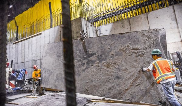 MTA workers installing a concrete tunnel liner