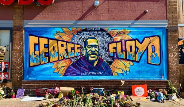 George Floyd Memorial Artwork on the side of a brick building