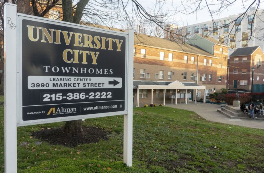 Leasing sign in front of University City Townhomes