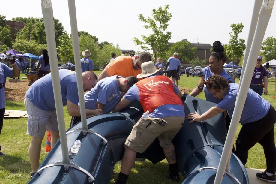 KABOOM! volunteers build playground