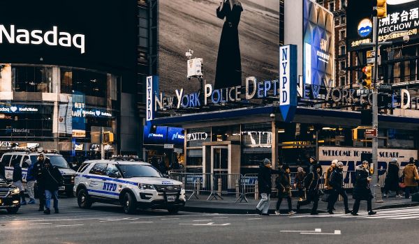 An NYPD car parked outside the police station