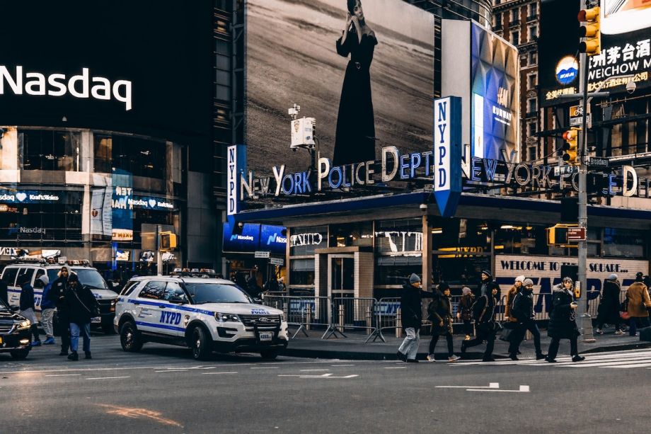 An NYPD car parked outside the police station