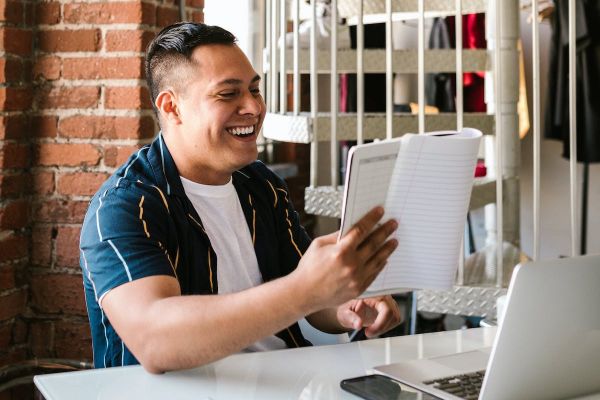 Latino man working on a project